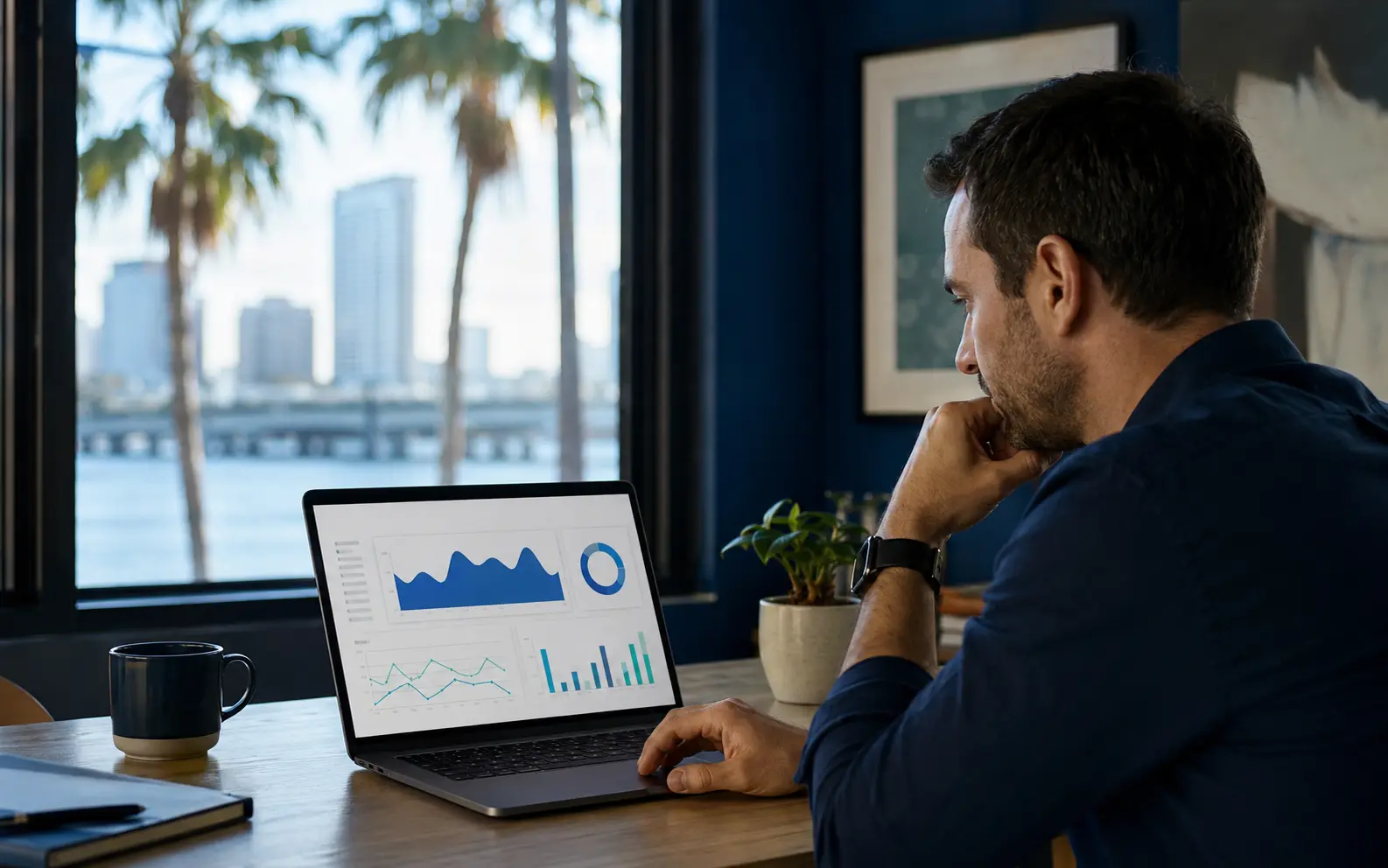 Business owner reviewing local SEO and website performance data on a laptop